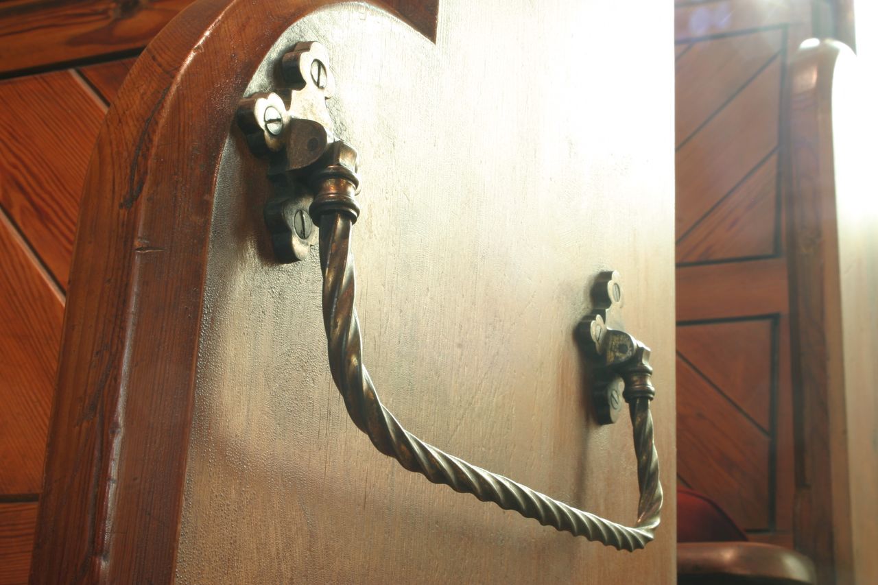File:URCPewMetalwork.jpg